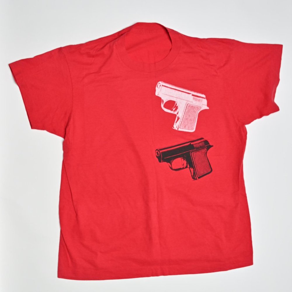 Red Tee Shirt with Guns graphic